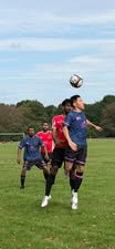 Welsh Warrior F.C. player heading the ball
